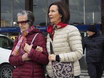 People standing in bus during winter