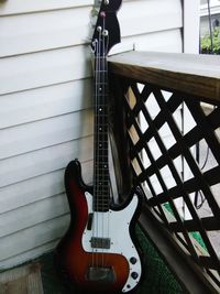 High angle view of guitar on table