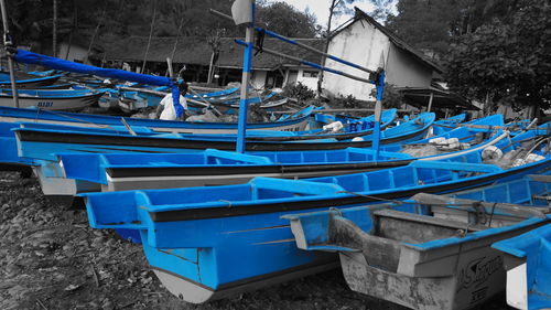 Deck chairs on shore during winter