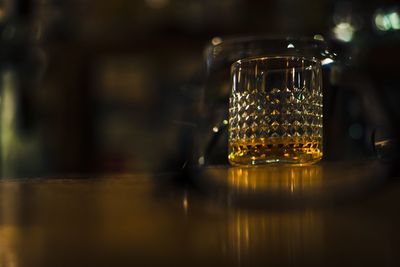 Close-up of wine glass on table