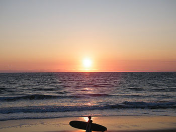 Scenic view of sea at sunset