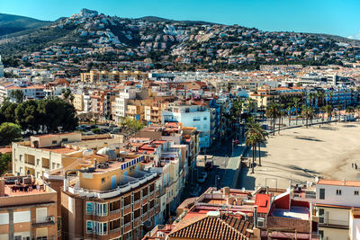 High angle view of town by sea