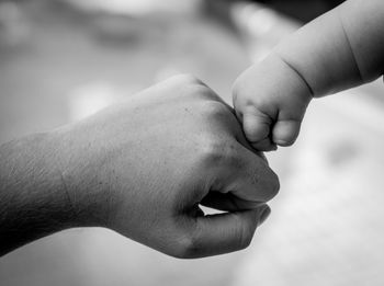 Close-up of fist bump