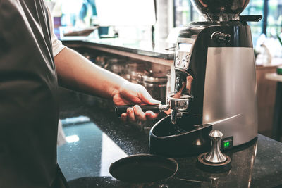 Man working with coffee cup