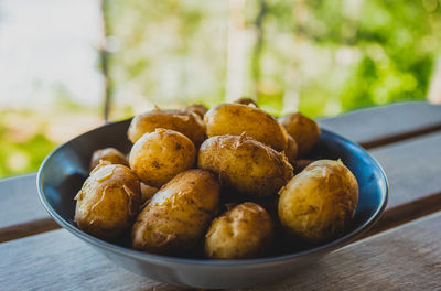 Close-up of cooked potatoes in bowl on table