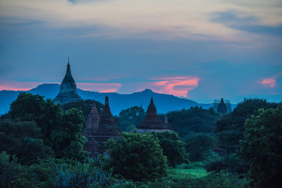 Silhouette of pagodas at sunset