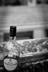 Close-up of water bottle on glass
