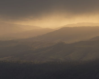 Scenic view of mountains against sky during sunset