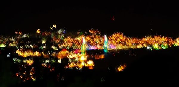 Blurred motion of illuminated lights at night