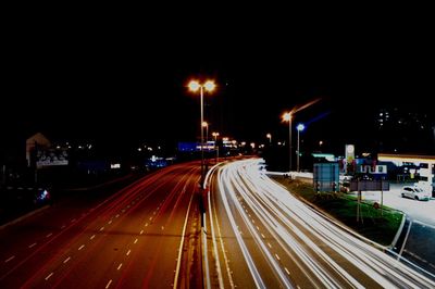 Light trails on road at night