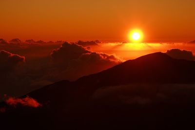 Scenic view of dramatic sky during sunset