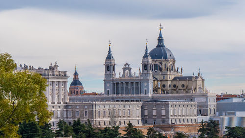 Buildings in city against sky