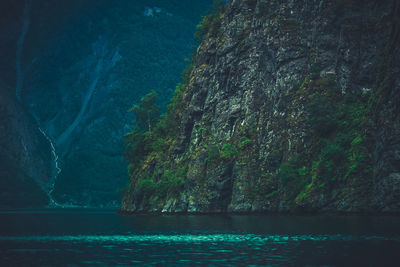 Scenic view of sea against mountain