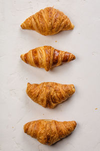 Directly above shot of croissants on table