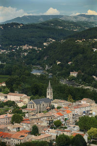 High angle view of town by buildings in city