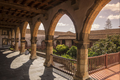 Interior of historic building against sky