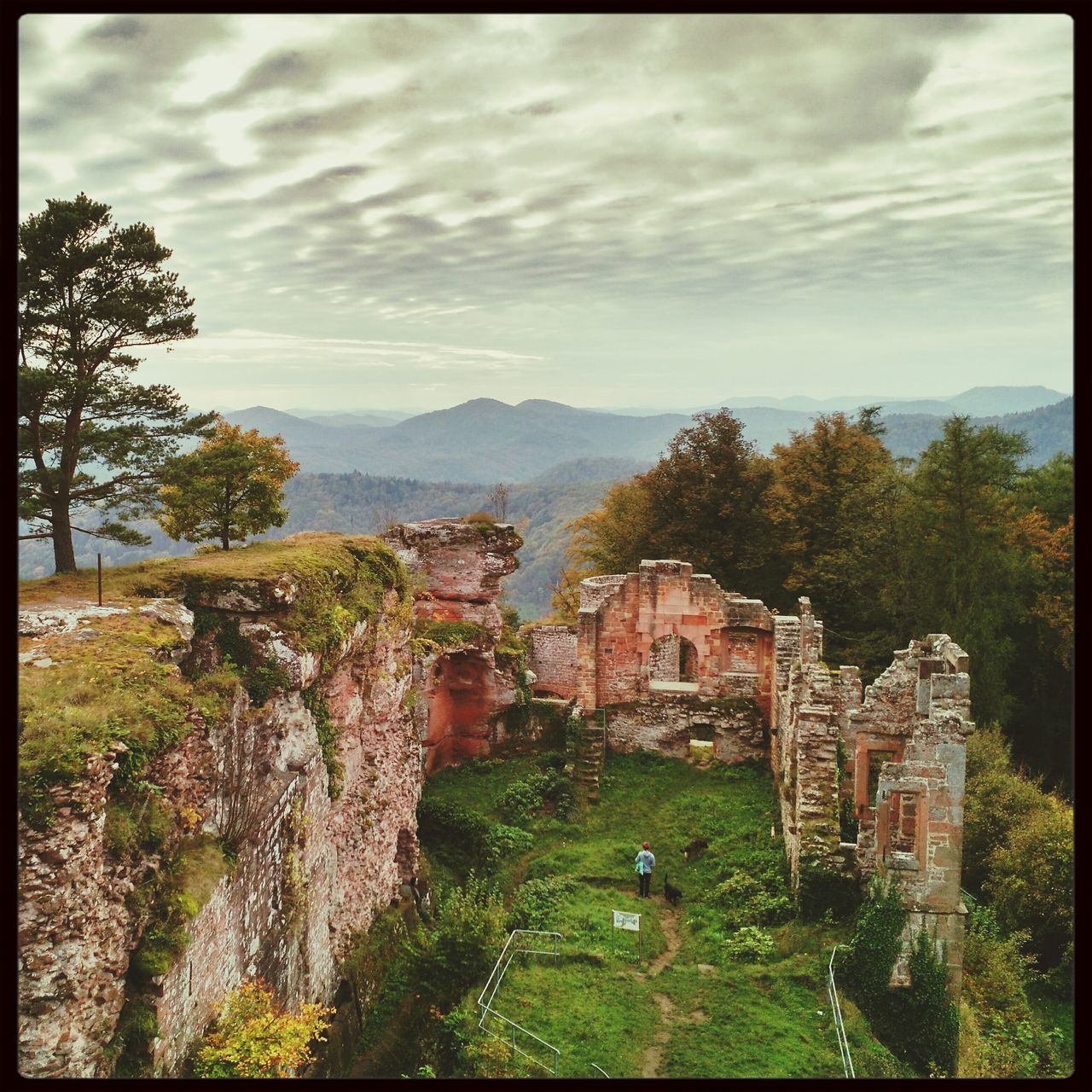 transfer print, sky, built structure, architecture, tree, building exterior, auto post production filter, cloud - sky, cloud, cloudy, house, mountain, landscape, old ruin, old, nature, green color, history, hill, day