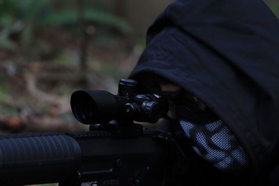 Close-up of man photographing