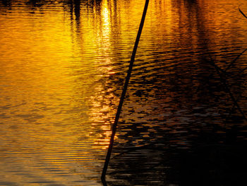 High angle view of lake against sky during sunset