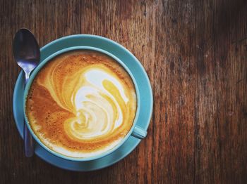 Close-up of cappuccino on table