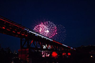Low angle view of firework display