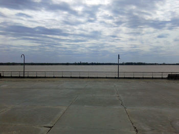 View of calm sea against cloudy sky