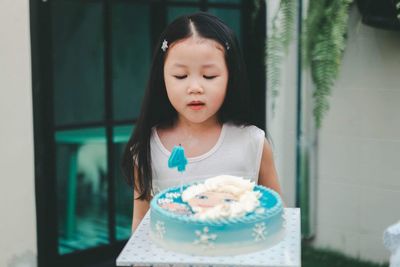 Girl holding ice cream