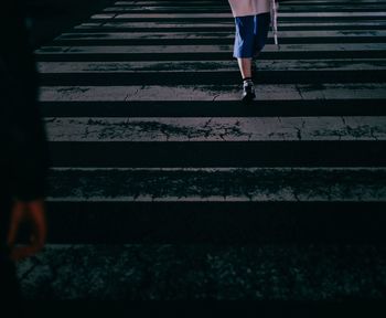 Low section of people standing on steps