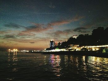 Illuminated city at dusk
