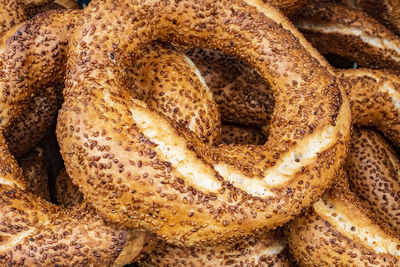 Close up ready to eat turkish bagel named simit with sesame