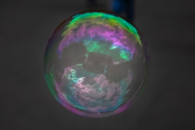 Close-up of bubbles against black background