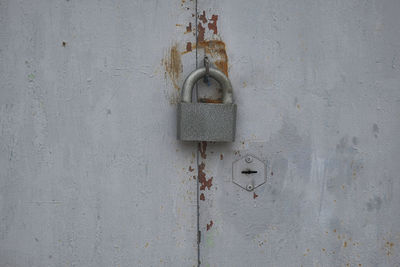 Close-up of padlock on door
