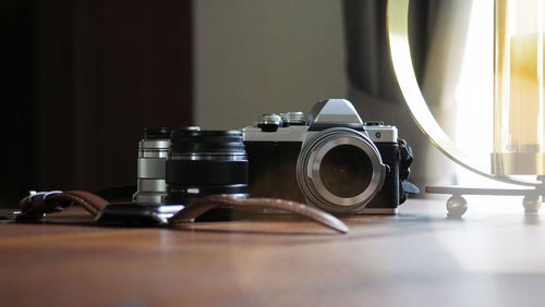 Close-up of camera on table