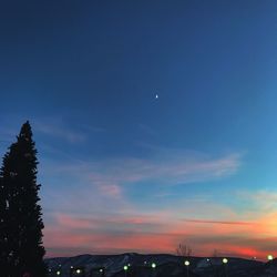 Scenic view of moon against sky at night