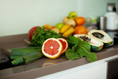 There are fresh vegetables and fruits on the table