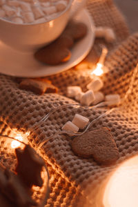 High angle view of coffee cup with marshmallows