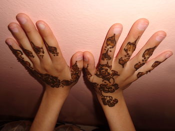 Close-up of woman hand with tattoo