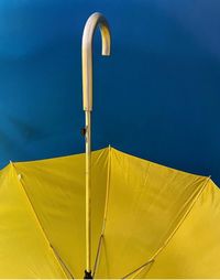Low angle view of tent against blue sky