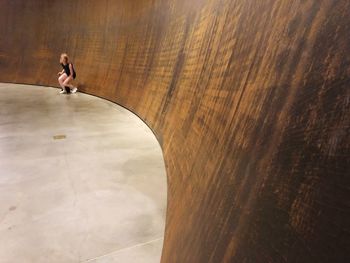 High angle view of woman on wall