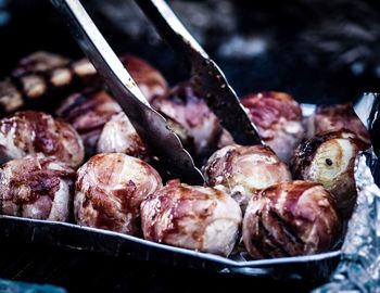 High angle view of meat on barbecue