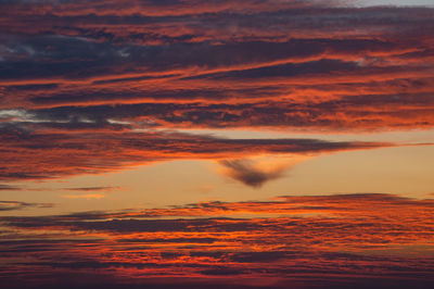 Low angle view of dramatic sky during sunset