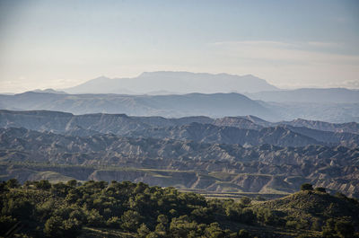 High angle view of landscape and mountains against sky