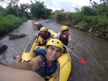 Portrait of people in river