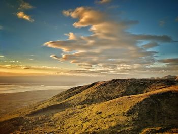 Scenic view of landscape against sky during sunset