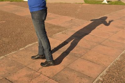 Low section of woman standing on floor