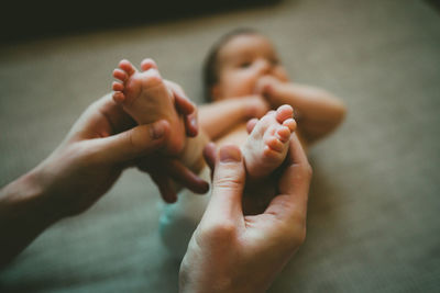 Close-up of couple holding hands