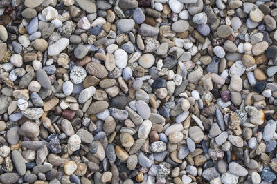 Full frame shot of pebbles on beach