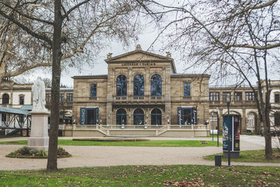 Facade of historic building against sky