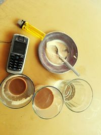 High angle view of coffee cup on table