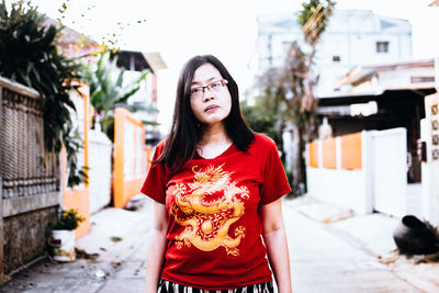 Young woman standing outdoors